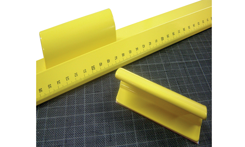 Držalo za rumeno varnostno ravnilo